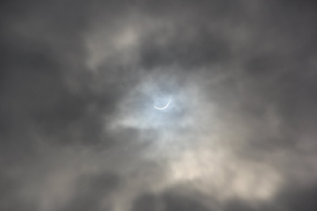 The Eclipse breaking through the clouds. Credit: Adam Harris, ShefSEDS