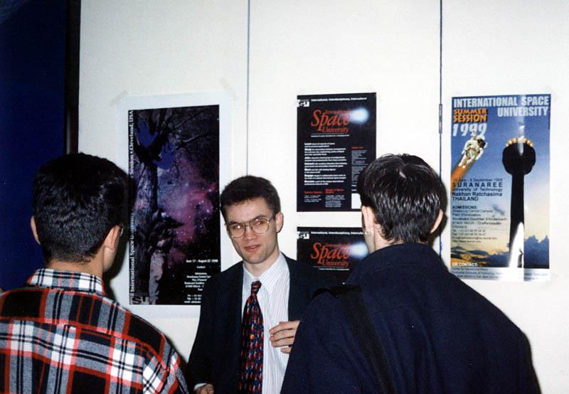 Andrew Ball speaking with a couple of interested delegates at the 1998 UKSEDS Conference at the University of Bristol about the International Space University. Photo credit: Mark Bentley