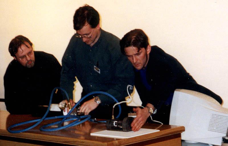 Adam Baker (right) with James MacFarlane (Centre) and Rick Newlands (left) at the 1999 UKSEDS Conference at the University of Kent. The group are demonstrating hybrid rocket propulsion. Photo credit: Mark Bentley